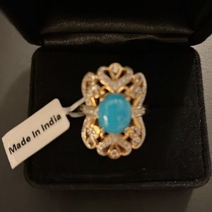 Turquoise and gold ring.